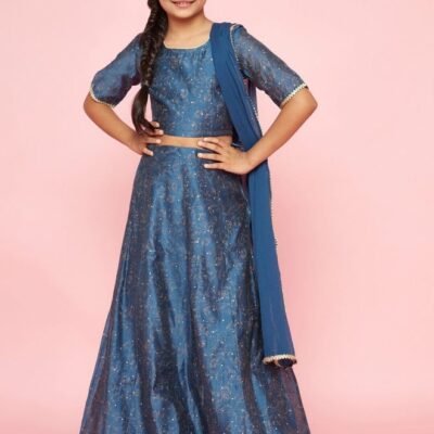 This beautiful blue lehenga choli set is perfect for young girls looking to make a statement at any