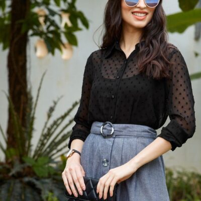 This stylish black semi-sheer dobby shirt is perfect for casual occasions. Made from high-quality